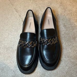 Black platform loafers